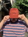 ＢＥＮＣＨ　／　Ｍａｒｕ　ｔａｃｋ　ｌｏｇｏ　Ｃａｐ　（Ｏｒａｎｇｅｂｒｏｗｎ）