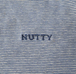 ｎｕｔｔｙｃｌｏｔｈｉｎｇ　／　Ｍｕｌｔｉ　Ｂｏｒｄｅｒ　Ｌｏｇｏ　Ｔｅｅ　（ＮＡＶＹ　ＢＬＵＥ）